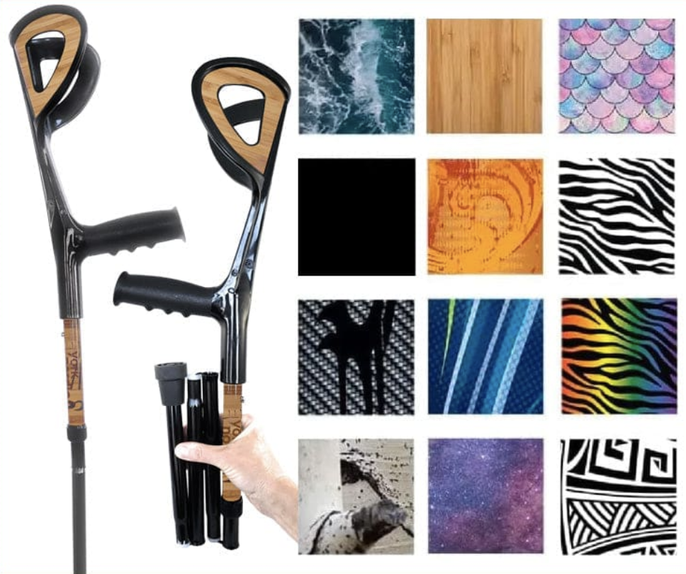 On the left is a pair of forearm crutches with black and wood print on the arm cuffs and about 20cm below the handles. The first crutch is unfolded, the second is folded up into four sections three smaller sections below the handle and arm cuff and a bigger one that includes the handle and arm cuff. A person's hand is holding the folded crutch. On the right is a grid of colours and patterns four rows tall and three columns wide. From top left to bottom right the colours and patterns are ocean surf, wood grain, pink and blue mermaid scales, solid black, orange and red swirl, black and white zebra, grey and black metallic dots, light, medium and dark blue stripes with a bit of apple green, rainbow and black zebra, birch bark, purple and blue milky way space, black and white Maori graphic design.